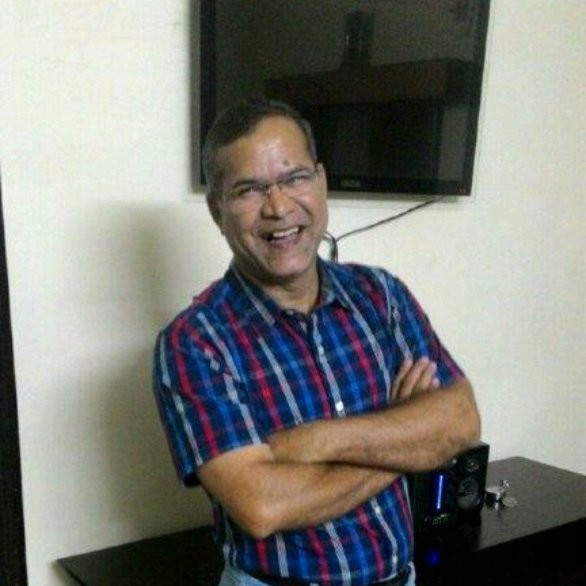 Portrait of Dinesh Shringi, Founder and CEO of Divya Drishti